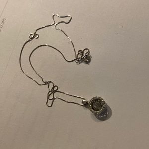 14K WG dancing diamond pendant necklace. Valued at Kay Jewelers for $1400.